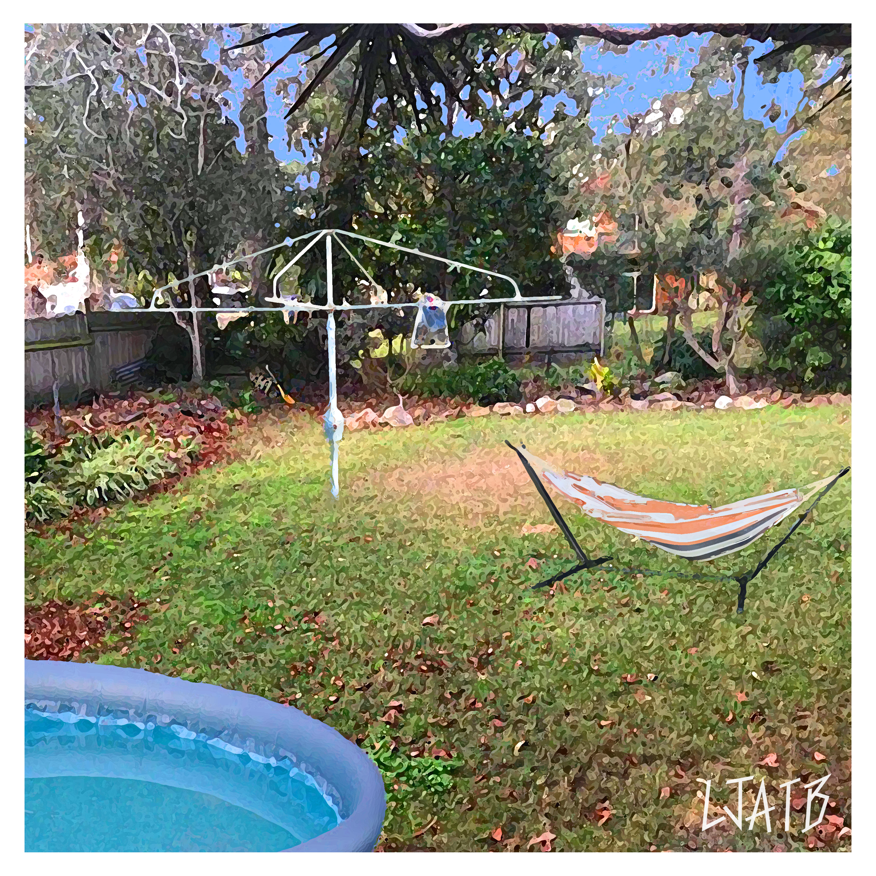 Hammock on a stand in a backyard with a pool and trees in the background