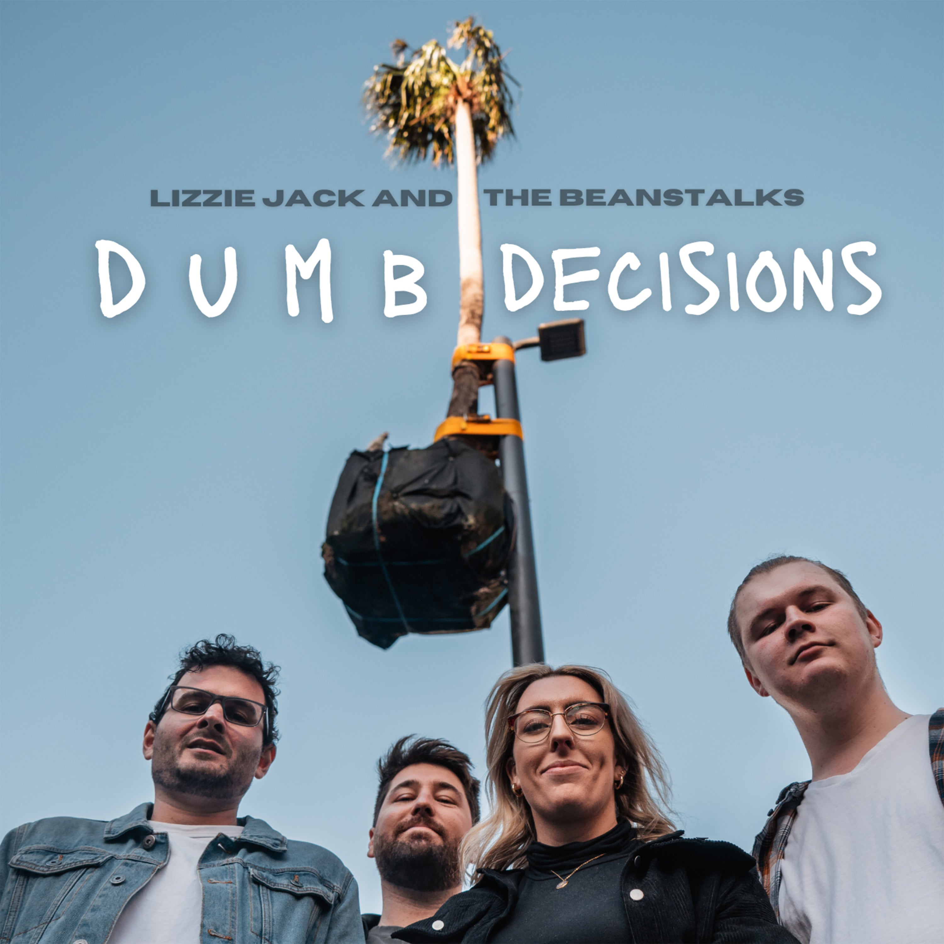 Album cover with four people and a pole with a bag and plant, against a blue sky.